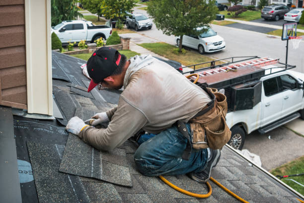 Professional Roofing technician working in Allston, MA